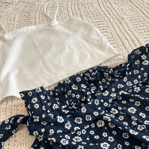 She in High waisted navy blue shorts with white tank - Picture 2 of 2